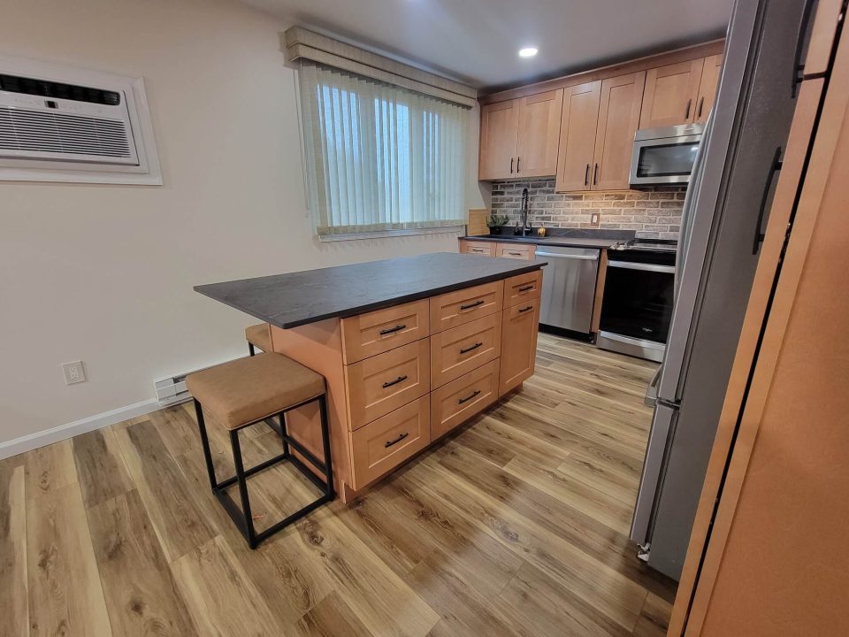 Finished Basement with a full kitchen including an island
